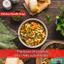 bowl of chicken noodle soup, filled with vegetables and noodles,